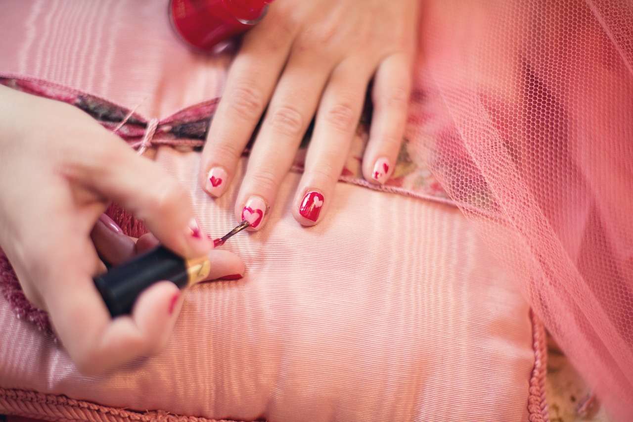 painting fingernails, nail polish, hearts